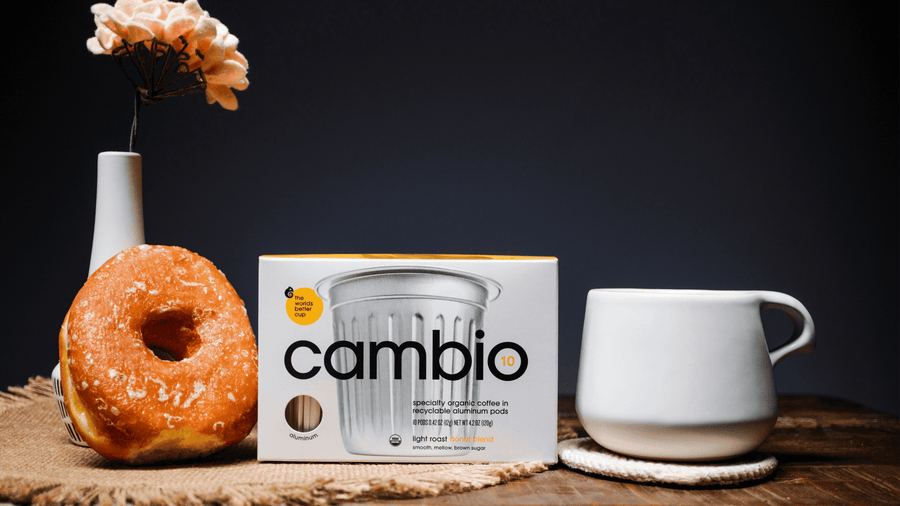 A cambio box for aluminum coffee pods with a donut