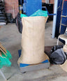 a potato sack with a ton of coffee beans inside