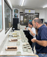 people testing coffee beans