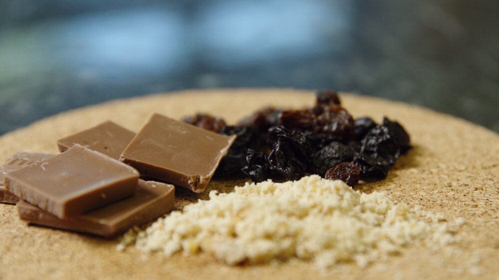 a platter of chocolate, spice, and raisins