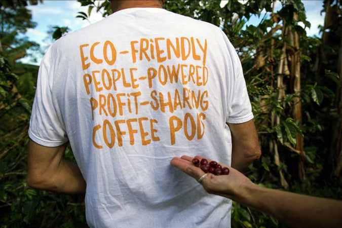 person wearing a shirt with eco-friendly on the back