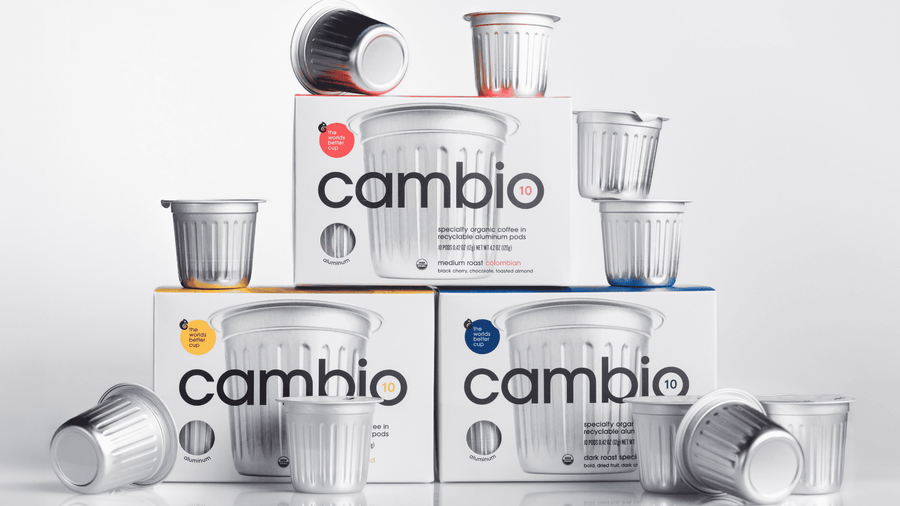 A big pile of cambio aluminum coffee pods all stacked up