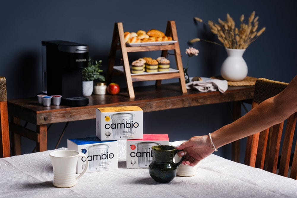 a table with cambio roasters coffee pods on it