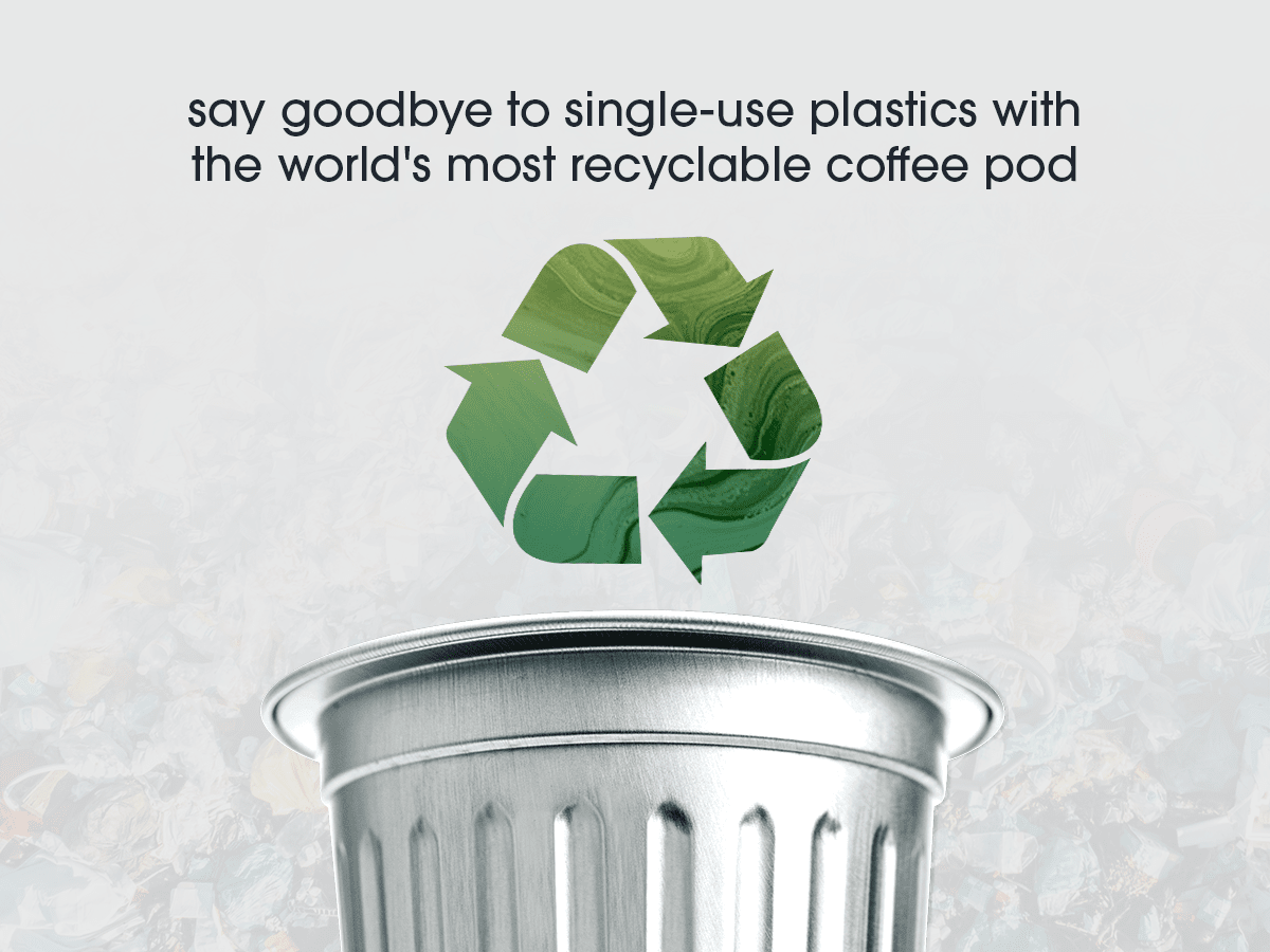 Recycling symbol on a coffee pod with text promoting recyclability.
