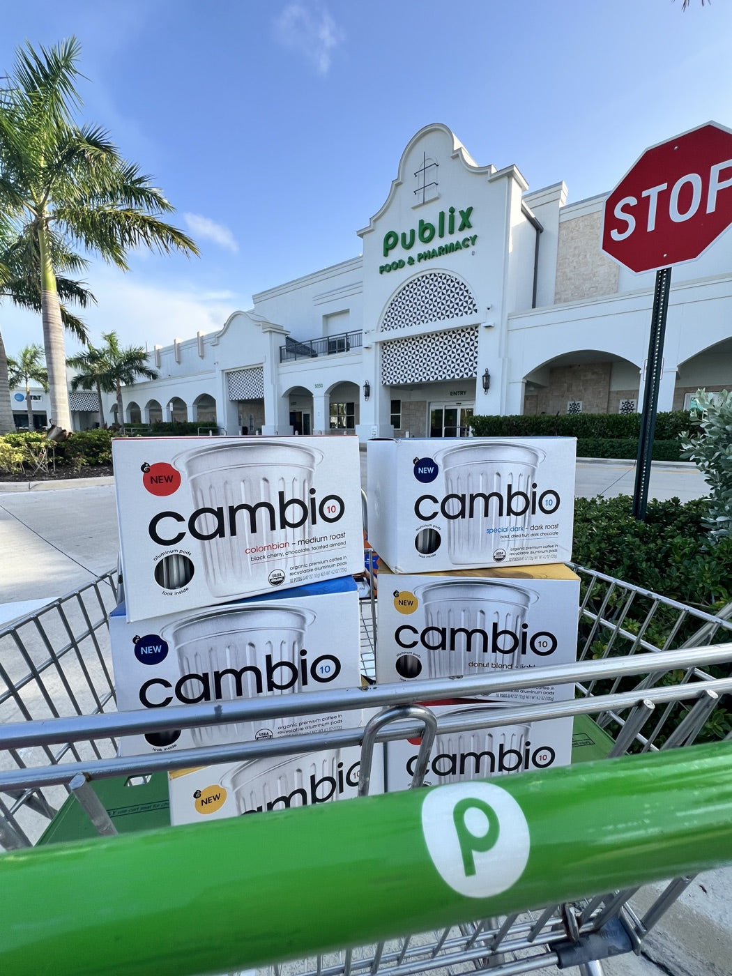 Cambio Roasters boxes in a Publix shopping cart